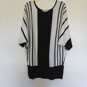 A Knitch Above Black and White Striped Sweater